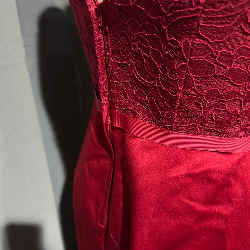 David’s Bridal ladies red in color size 4  dress.